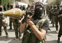 Iran trains Gazans to operate anti-tank missiles Gazan holds anti-tank missile (illustrative)