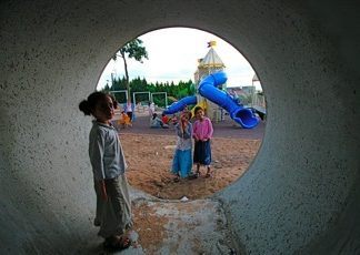 Concrete caterpillars : Bomb shelters at the playground